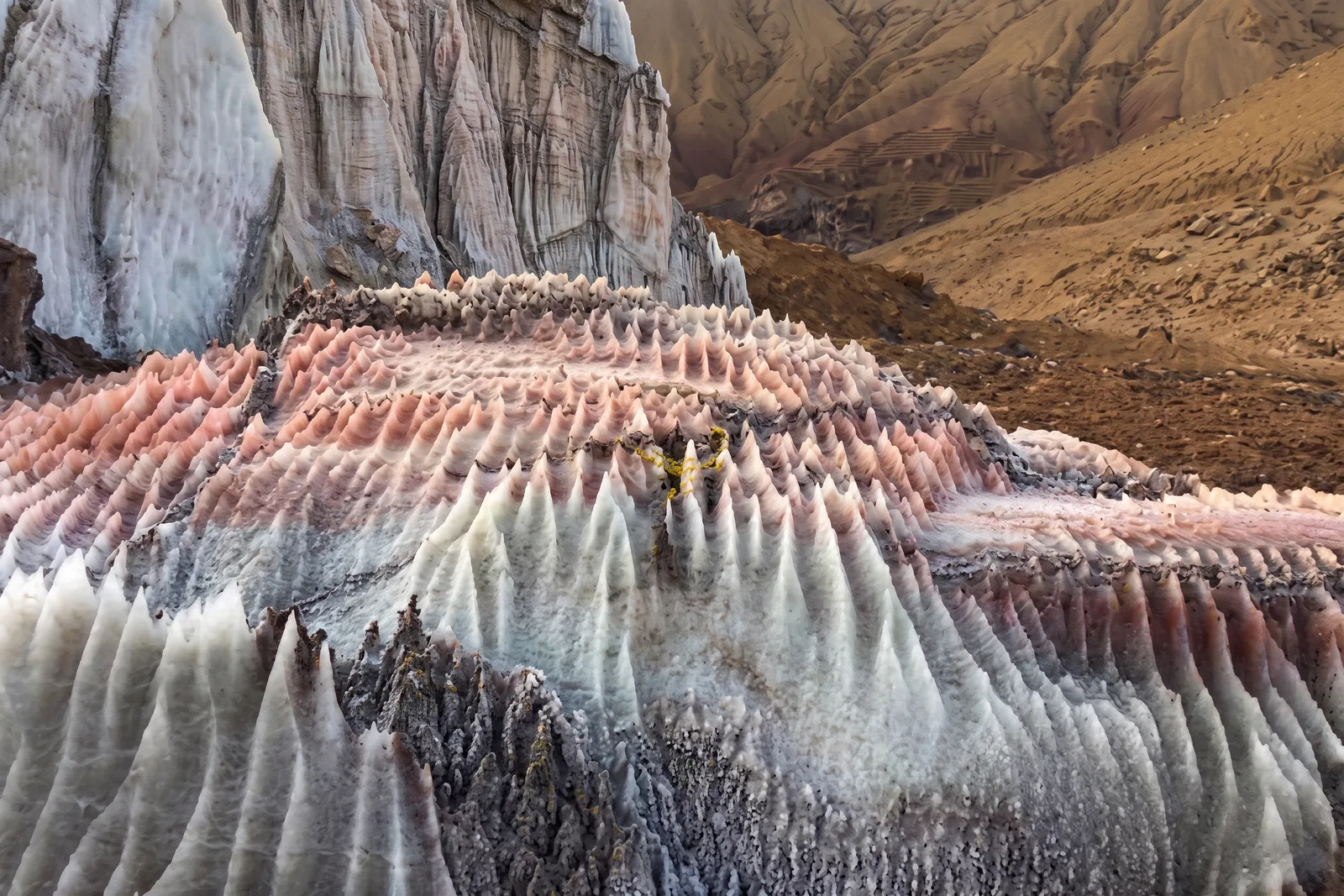 Ancient blue salt rock formations in a desert landscape