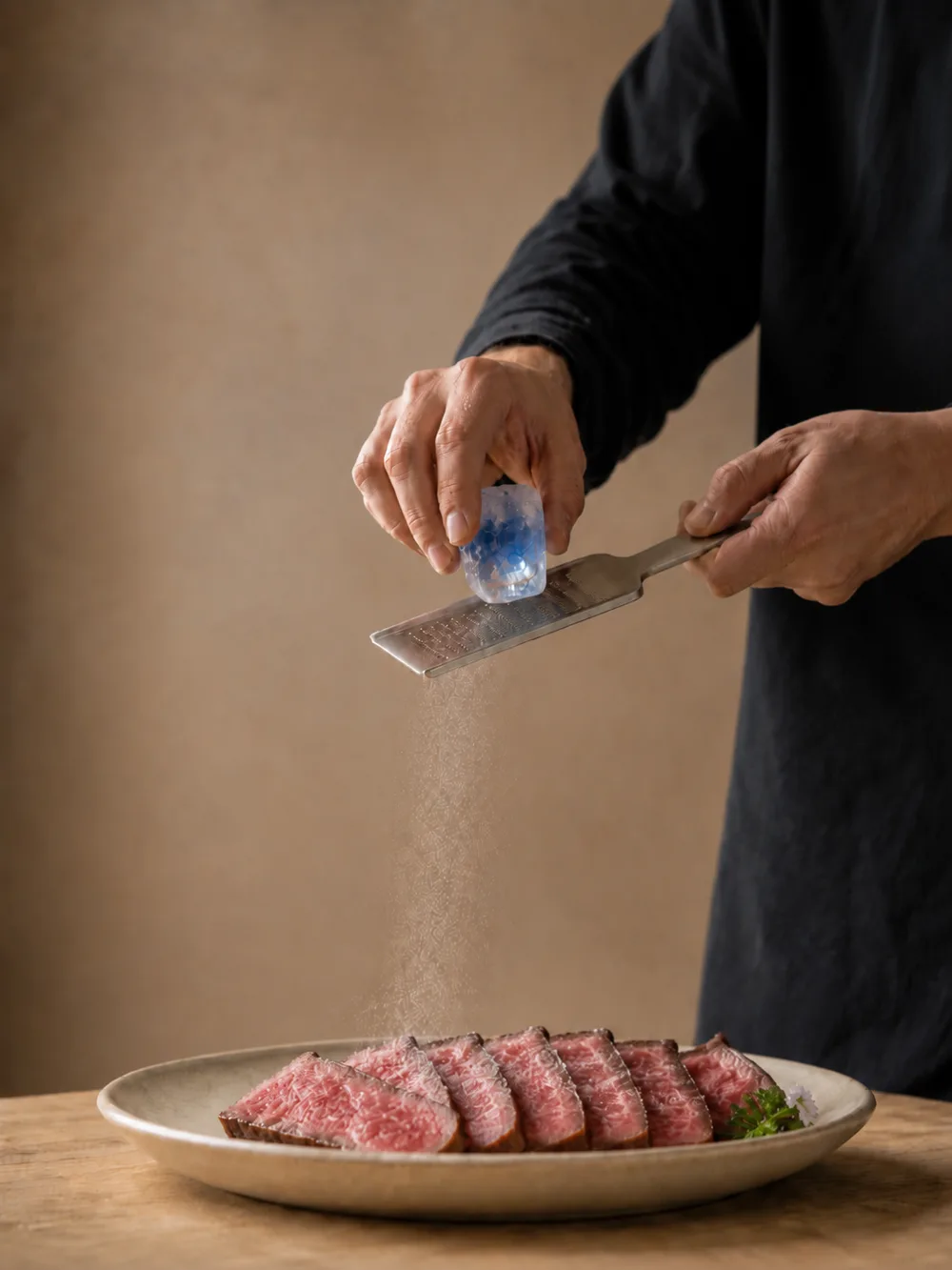 Grating an indigo crystal at the table